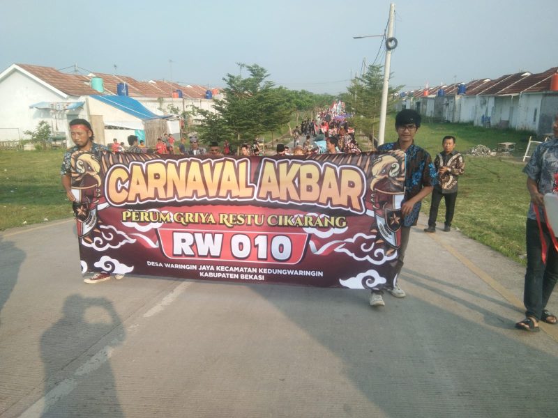 Keterangan Poto : Warga Perumahan Griya Restu gelar karnaval Akbar memperingati Kemerdekaan HUT RI ke-80