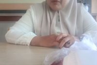 Keterangan Poto: Hj.Juhariah Kepala Desa Kuta Makmur, saat menggelar milangkala ke 50 tahun