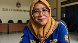 Keterangan Foto: Yeni Mulyani S.Pd.SD., M.Pd Kepala Sekolah SDN 1 Karawang Wetan